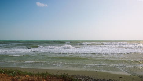 Empty-beach-of-Calahonda,-Spain,-after-a-storm-in-slow-motion