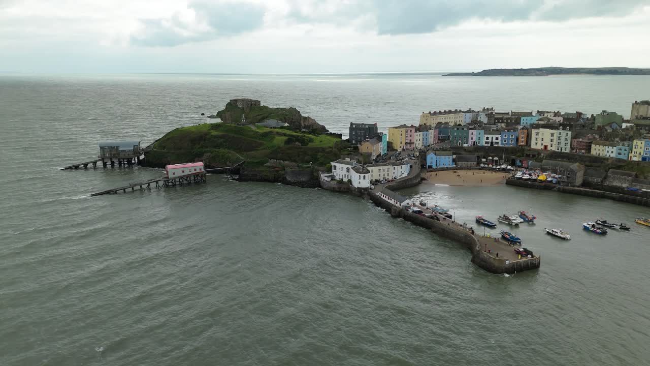 Welsh sandy beaches and colourful houses in Tenby, United Kingdom