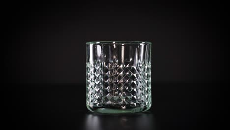 empty glass with ice cubes