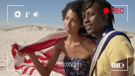 filmando una pareja en una playa con una cámara digital 4k