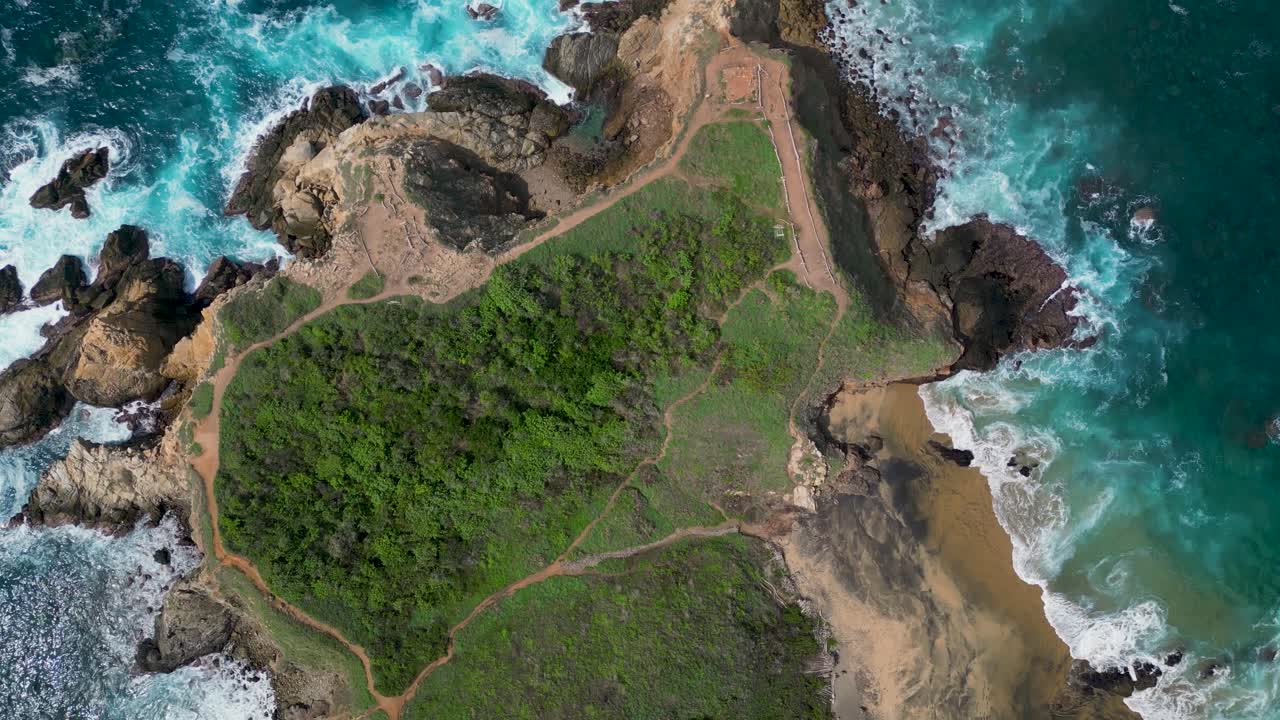 A Bird's-Eye: Capturing the Grandeur of Punta Cometa's Cliff