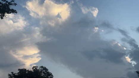 movement of white clouds and grey clouds