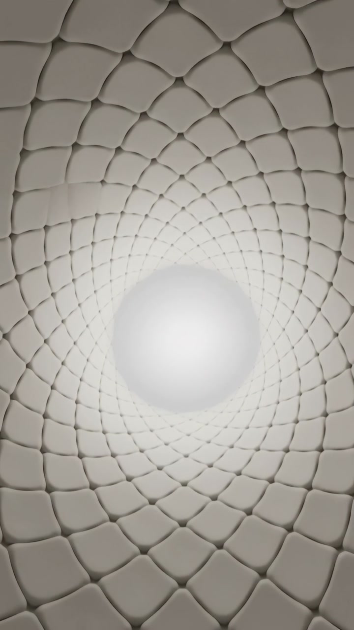 Vertical video: On play rounded tile spiral rotating, shifting in tunnel, orb pulsing to show depth