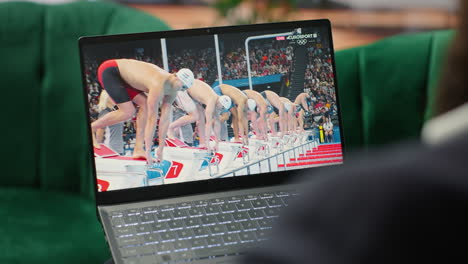 vertical video bucharest, romania - july 30th 2024 - leader supporting the national swimmer