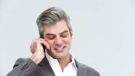 Mature-businessman-on-phone