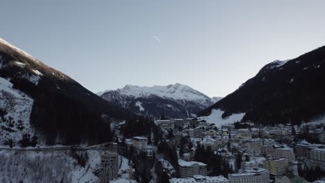 Drone-Flyover-of-Snowy-Valley-and-Mountain-Hotel-in-Salzburg-Austria