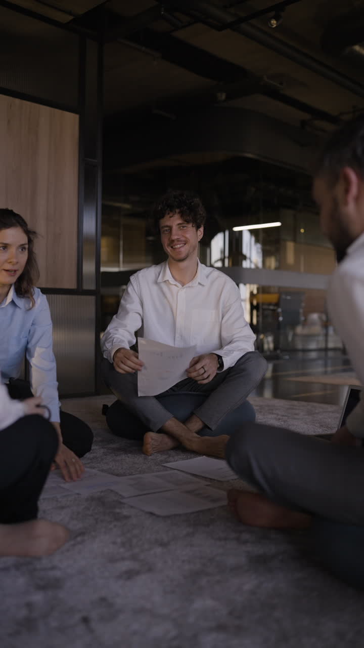 Business Team Meeting on the Floor