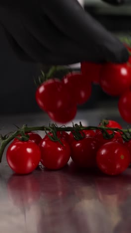 chef preparing cherry tomatoes