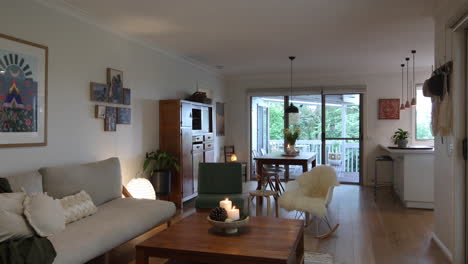 static shot revealing a modern-style interior with the warm flickering of candles