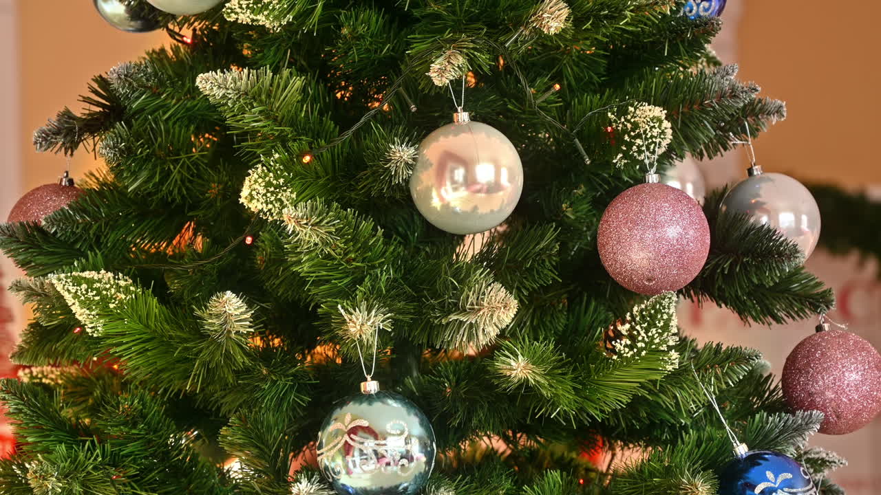 Close view of a decorated Christmas tree in a hall