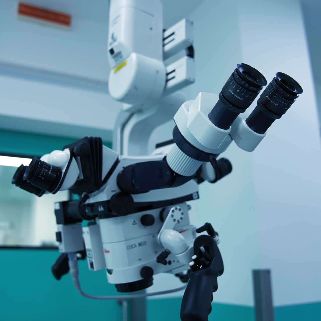 Powerful equipment necessary for operations. Circle footage around the advanced microscope in operational room