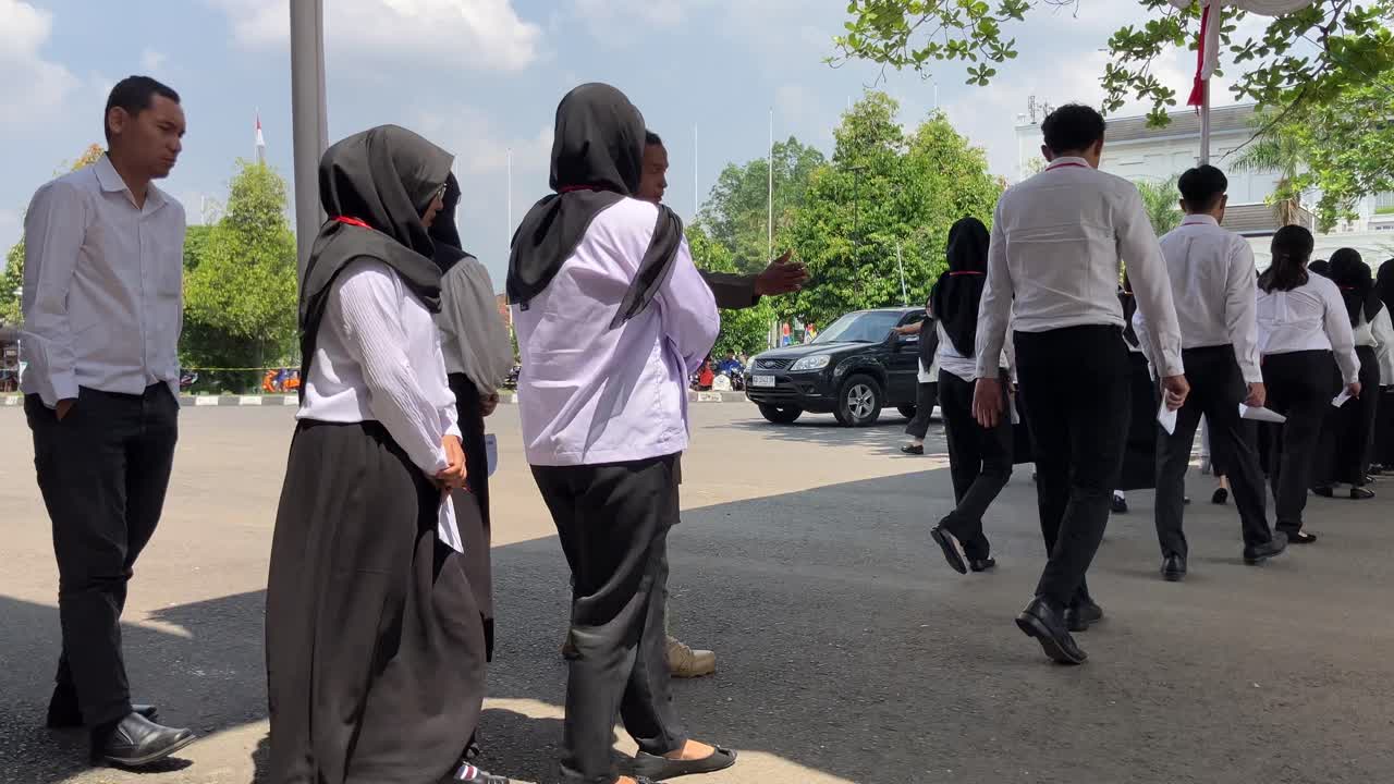 best 4k editorial footage of civil servant candidate recruitment test held simultaneously in a big city in Indonesia