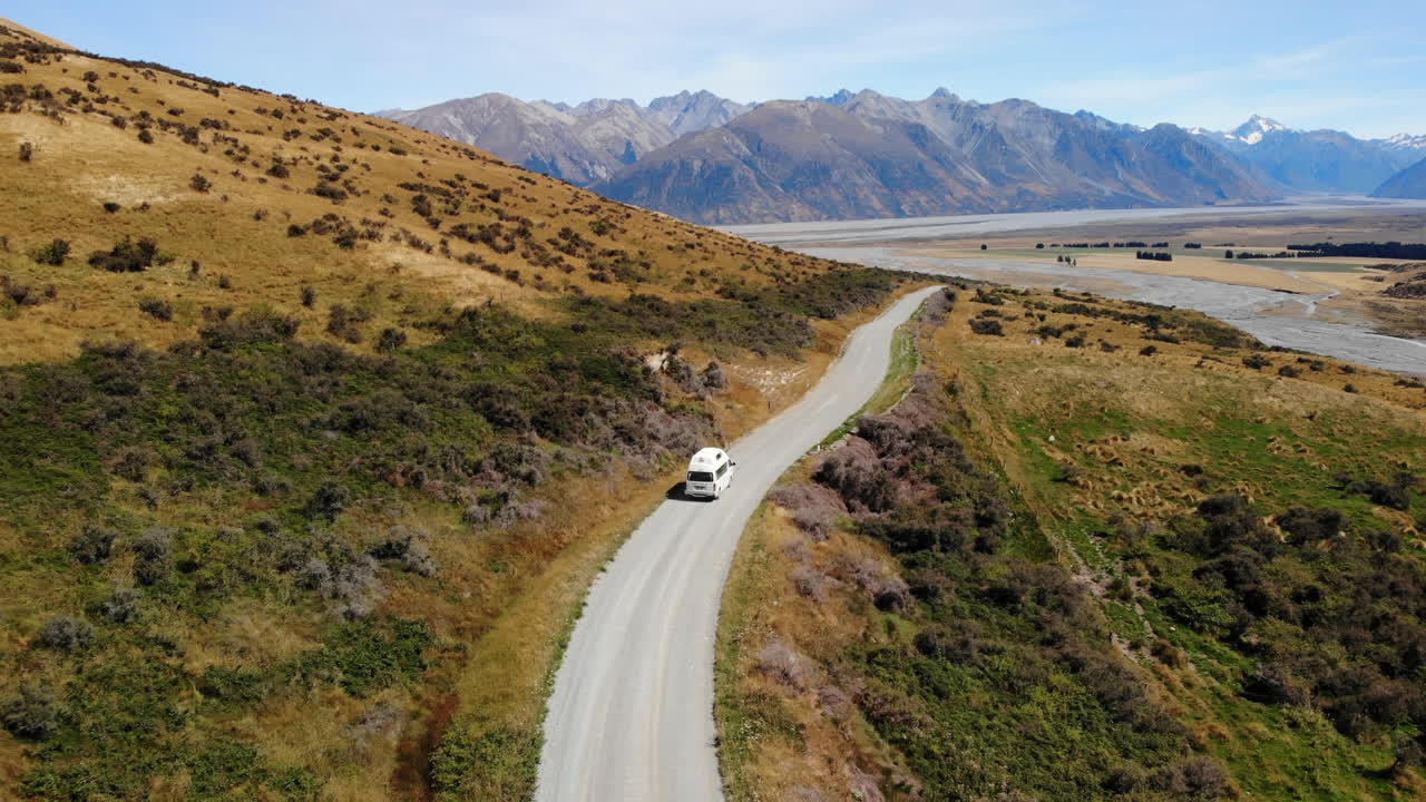 Travel Van life New Zealand mountains and lake Drone following 4k