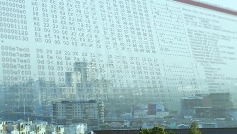 animation of data processing against aerial view of cityscape