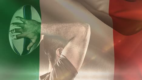 Animation-of-flag-of-italy-over-caucasian-male-rugby-player-with-ball-at-stadium