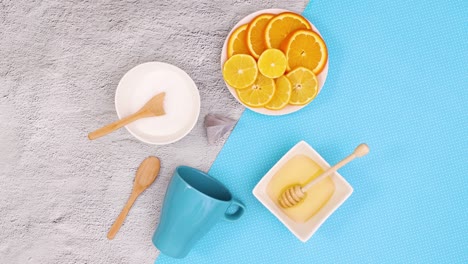 blue utensil for making tea appear on the table. stop motion