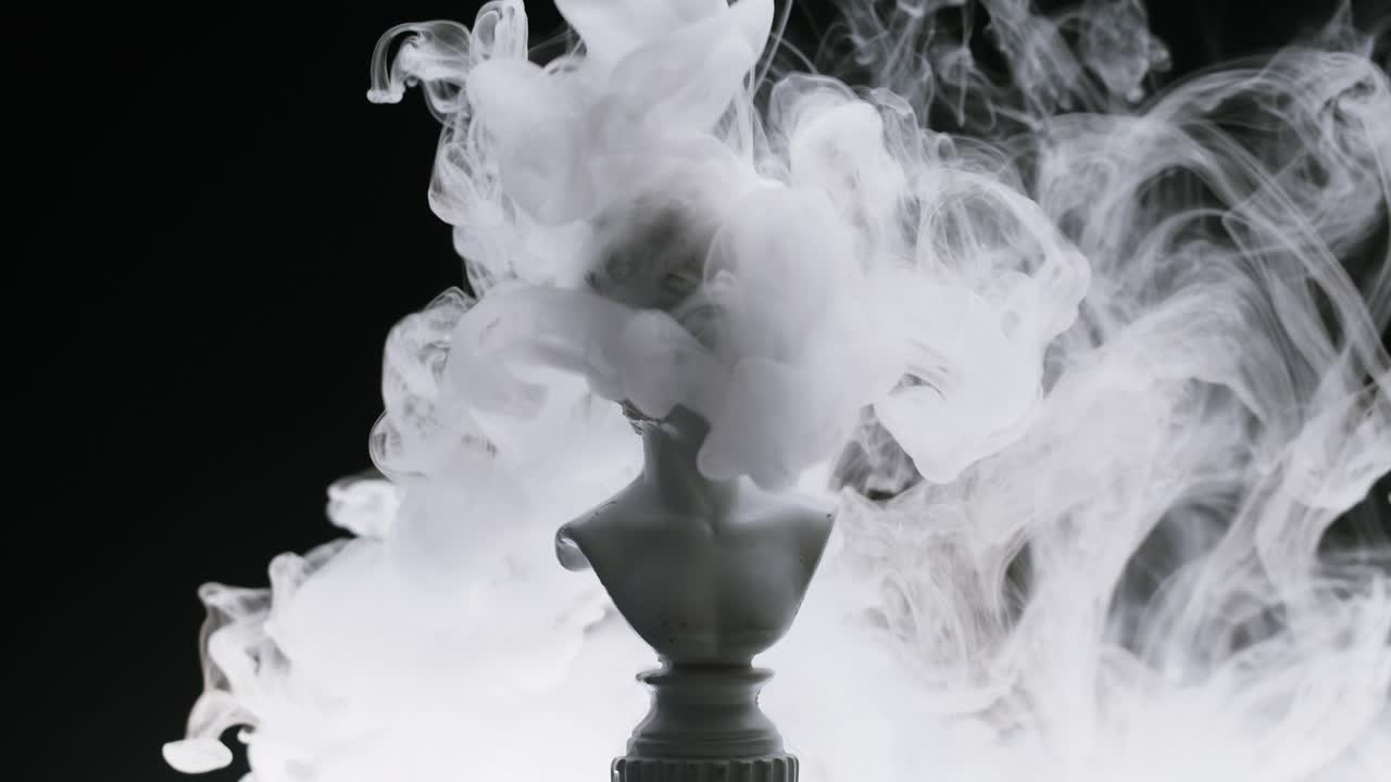 White Bust of Woman with Swirling Smoke on Black Background