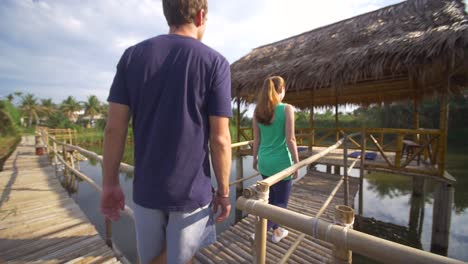 couple entering yoga hut 1