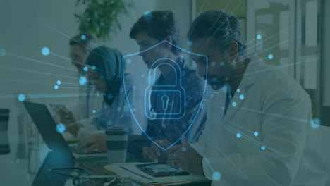 security lock animation over diverse professionals working on laptops and tablets