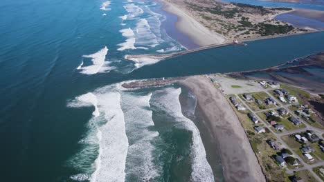 coquille river mouth meets the pacific ocean along bandon oregon coastline