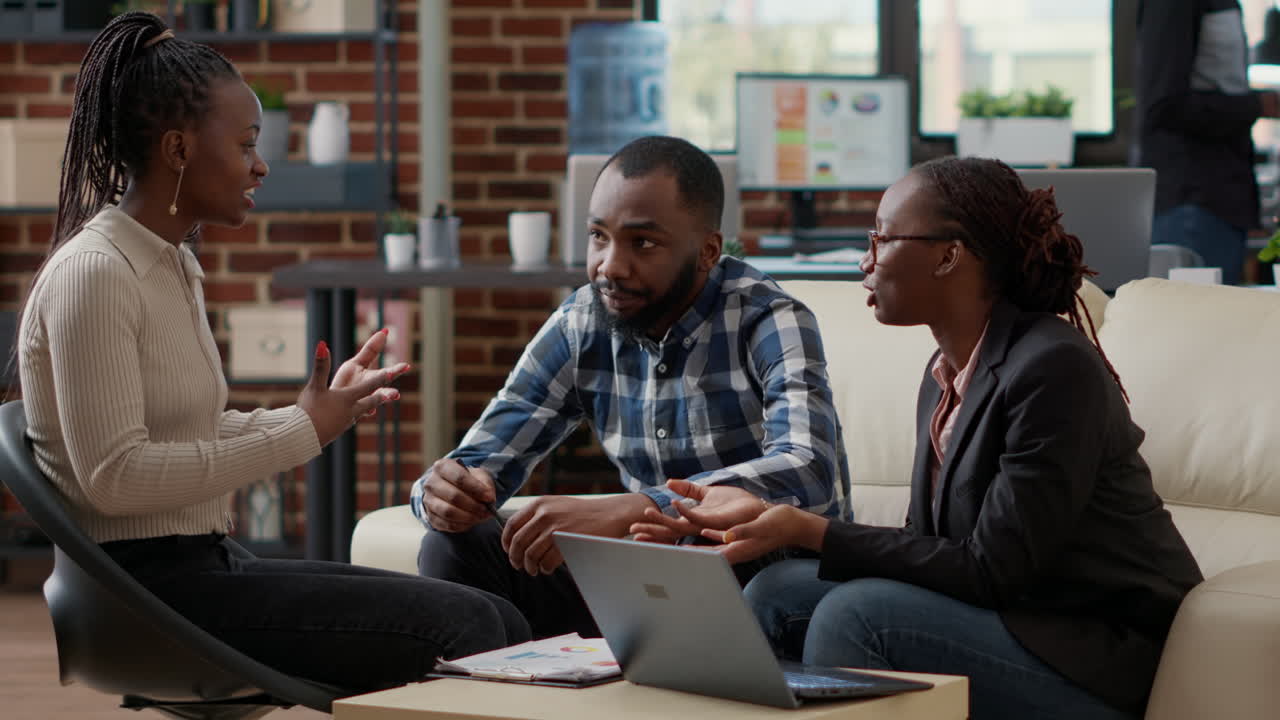 Group of employees brainstorming ideas to plan business strategy