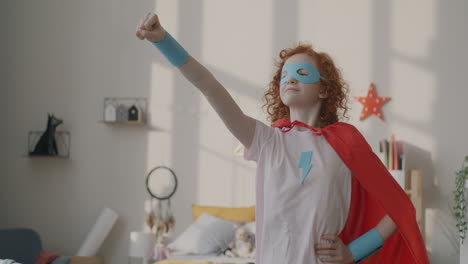 child dressed as a superhero