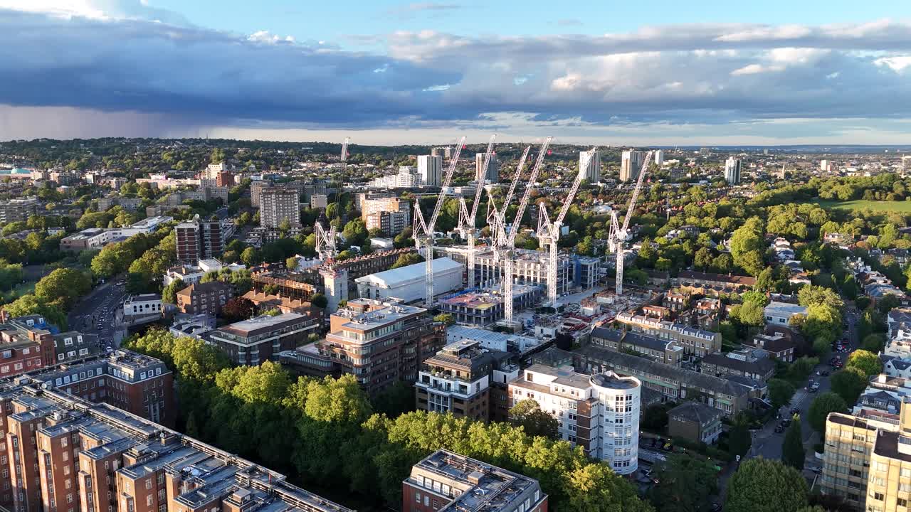 Dynamic aerial view of St John’s Wood Square, London, showcasing major urban development with cranes, construction activity, and city skyline, highlighting modern regeneration progress
