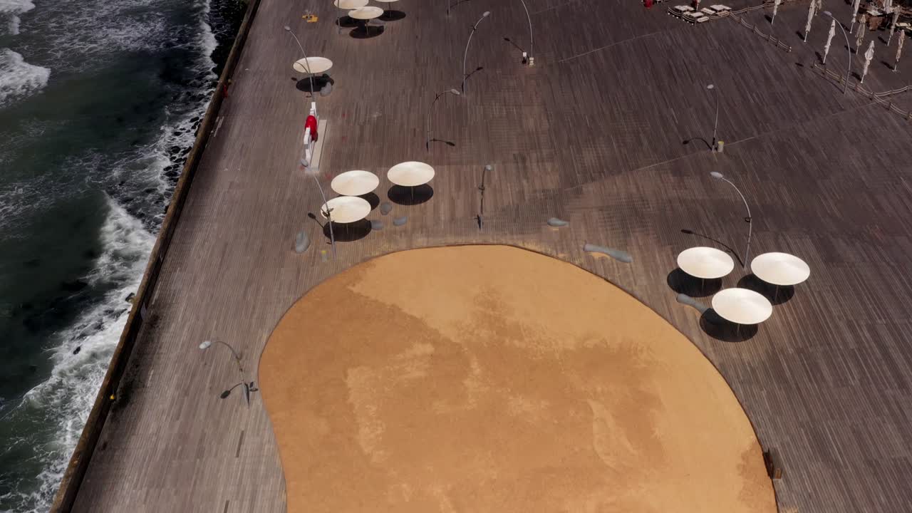 Coastal City Pier with Restaurants and People