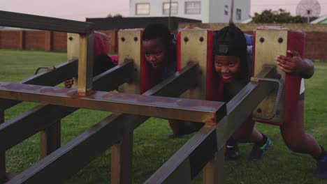 young adult female rugby players training