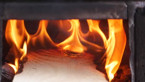 burning wood in a stove