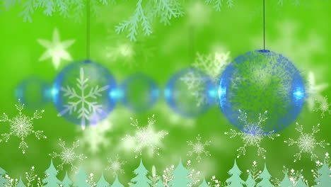 Multiple-blue-baubles-hanging-against-snowflakes-and-christmas-tree-icons-on-green-background