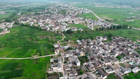 village and fields in shaxi, yunnan, china.