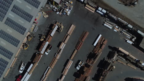 drone shot over an industrial lumber yard