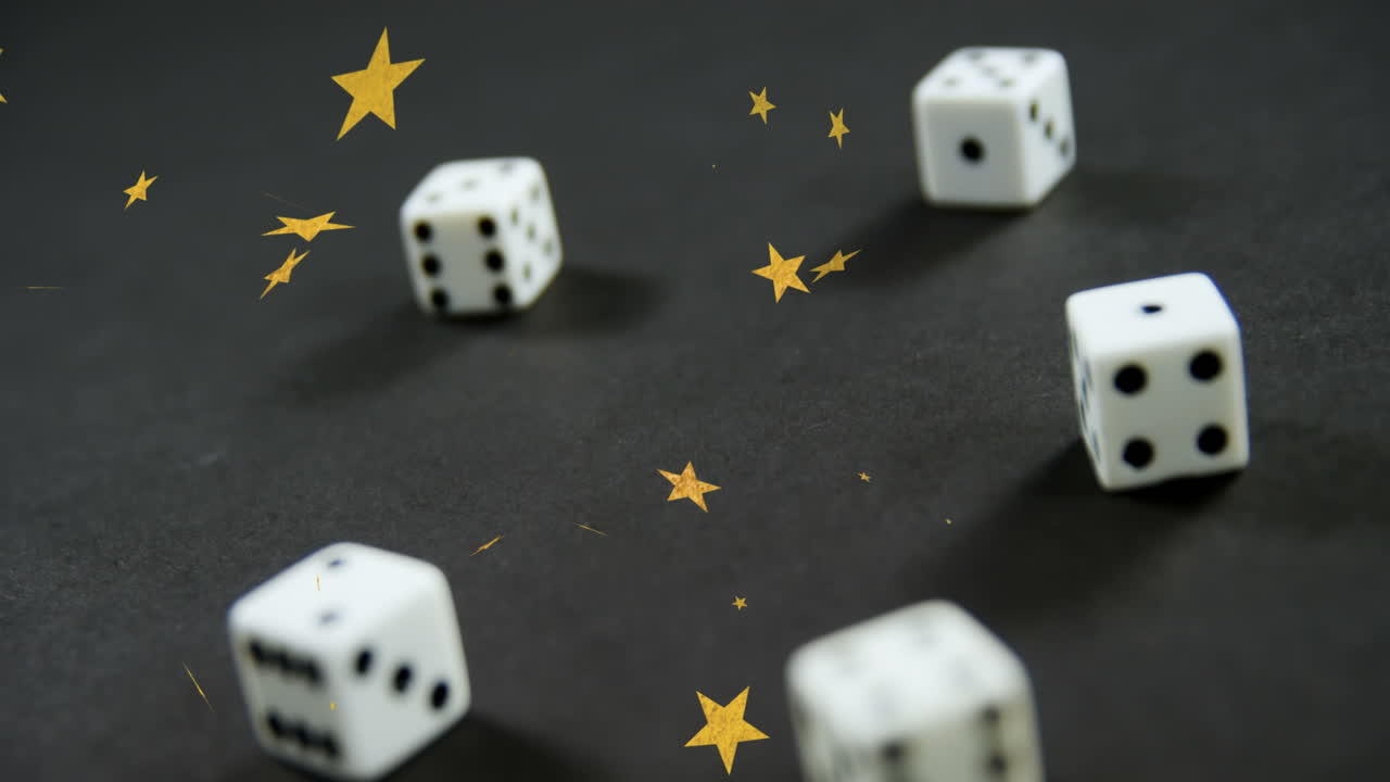 animación de estrellas doradas cayendo sobre dados blancos y rojos sobre fondo gris