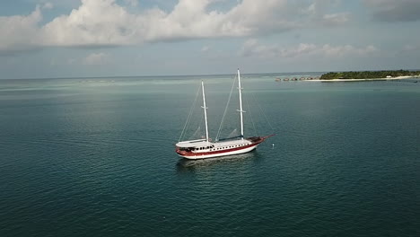 aerial view of sail boat in the indian ocean, maldives