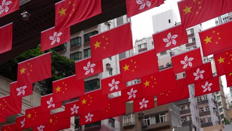 hong kong and china flag at hong kong lei tung street