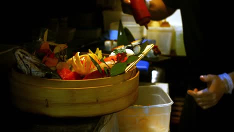 assortment of sushies and various vegetables on the steamer