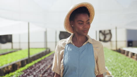 woman farmer in greenhouse