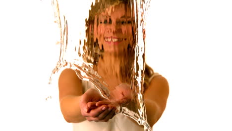 water falling on womans hands