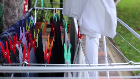 close-up-of-spreading-laundry-out-to-dry