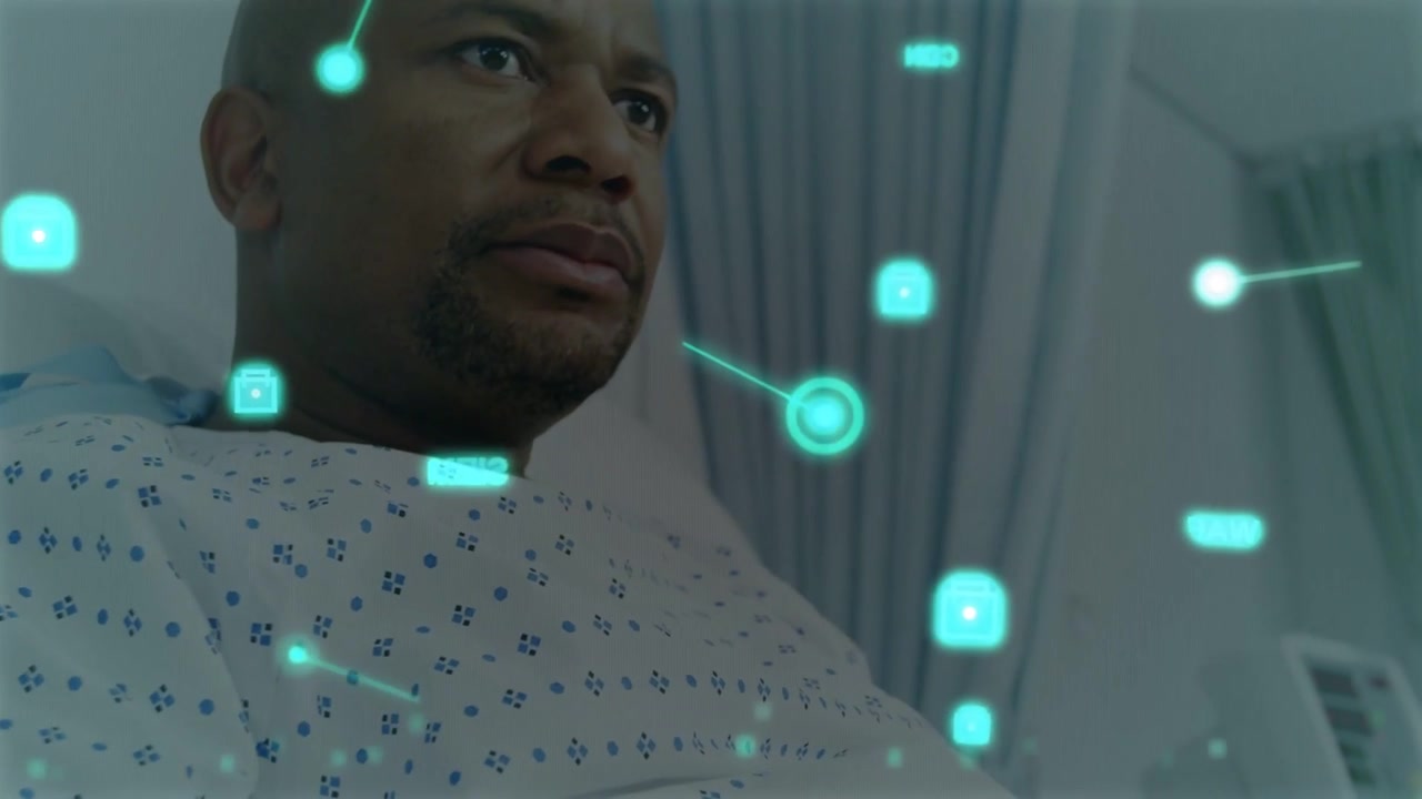 Vertical video: Male patient pressing call button in hospital checking vitals via cyan overlays
