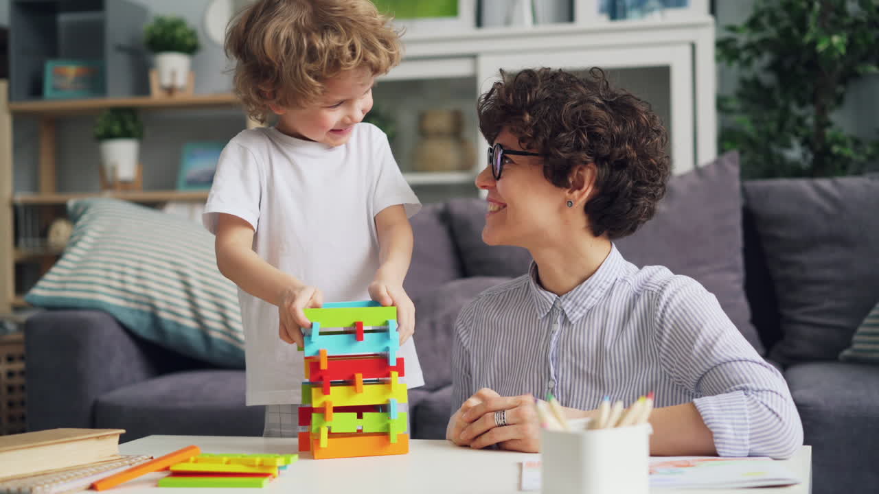 Mother and Child Playing with Building Blocks