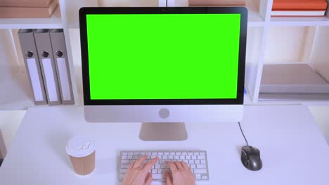businesswoman entering data in office