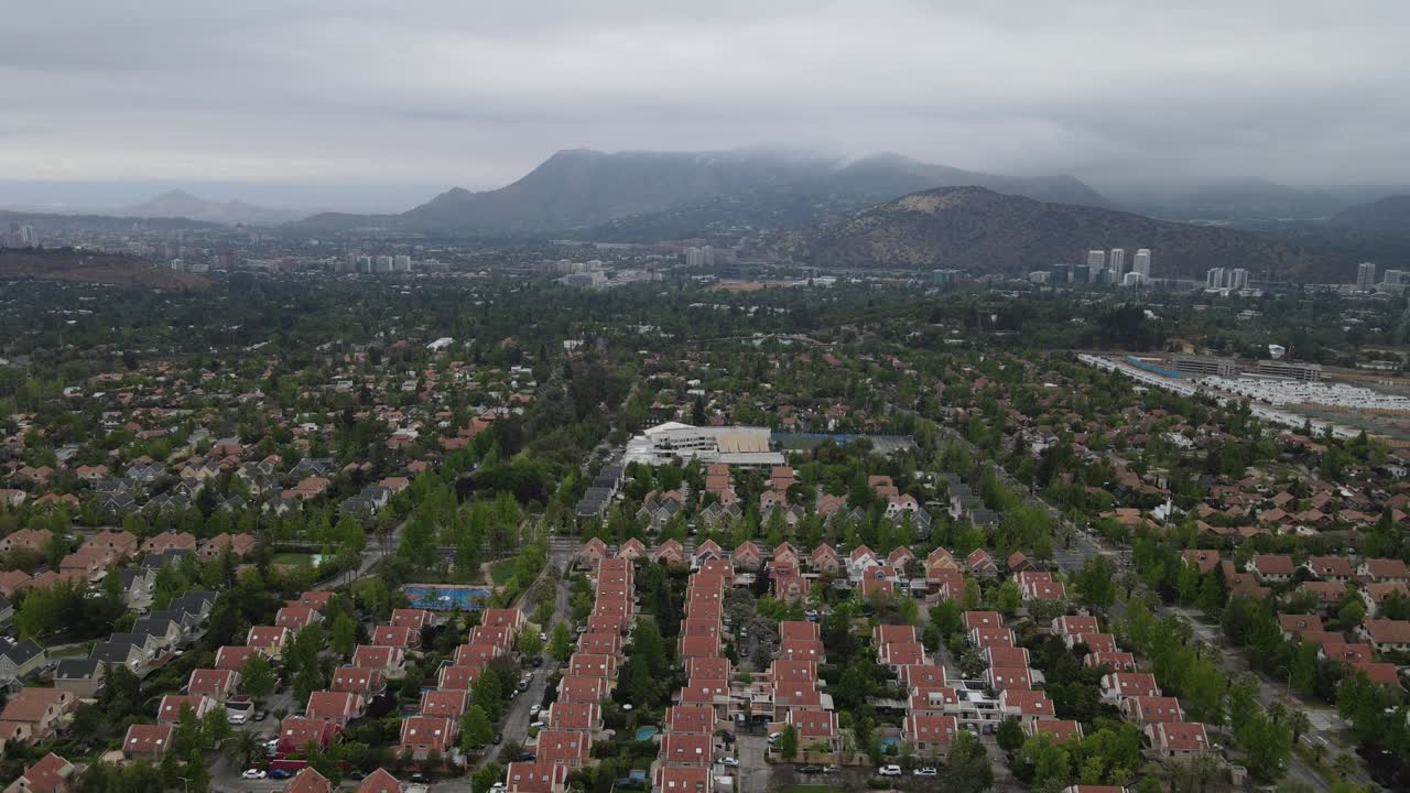 Residential areas are expanding into the foothills surrounding santiago, chile, showing urban growth and development