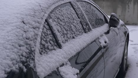 snowy black car