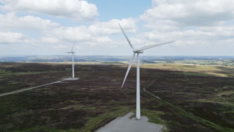 large wind farm situated on the west yorkshire moors taken using a drone
