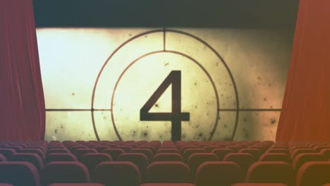 animation of retro movie countdown in circle at empty cinema theater with red chairs and curtains