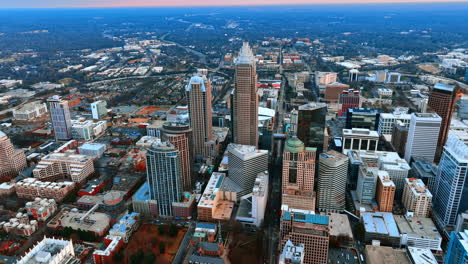 Splendid scenery of Charlotte, North Carolina, USA downtown on cloudy daytime. Distancing from city center with majestic skyscrapers