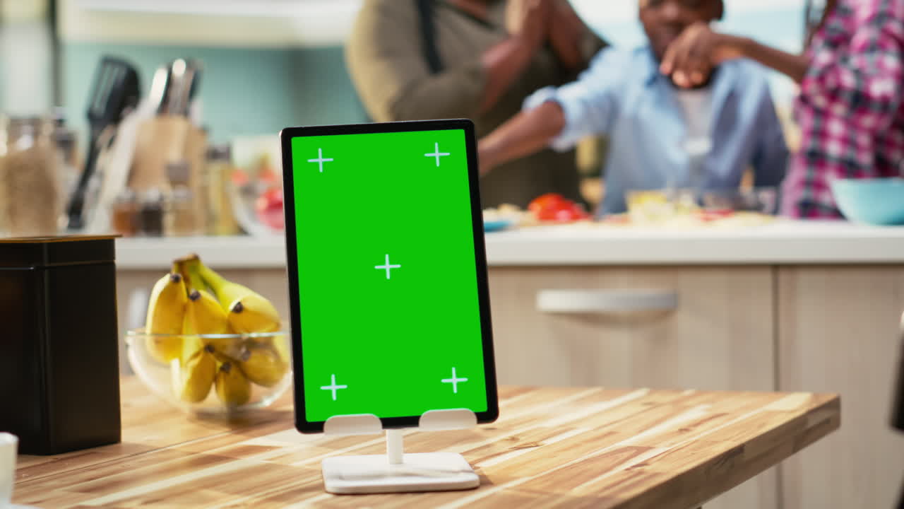 Tablet with green screen in kitchen
