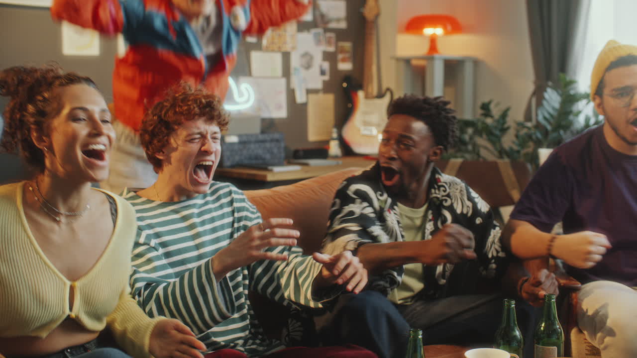 Sports Fans Watching Match on TV and Celebrating Victory with Excitement